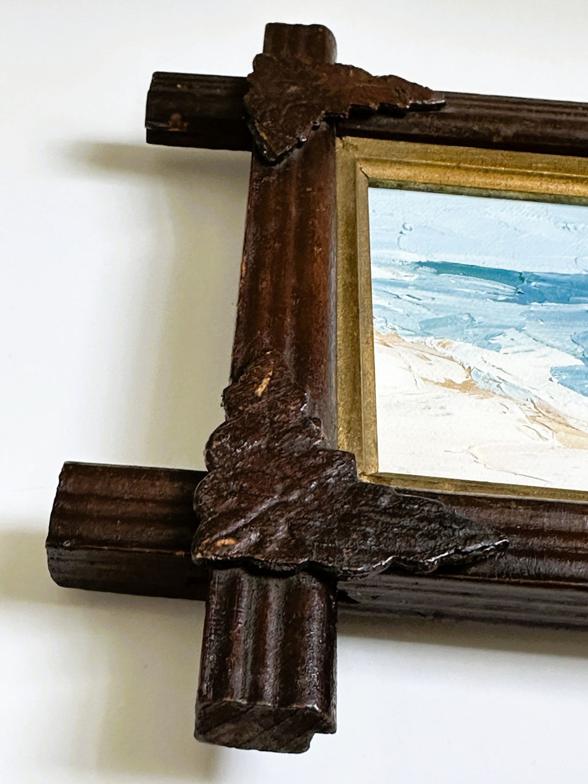 American Coastal Painting in Antique Adirondack Tramp Frame with Wood Leaf Corners